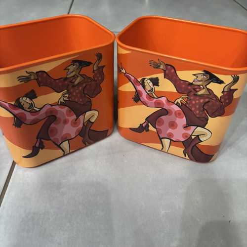 Tupperware canister with figures