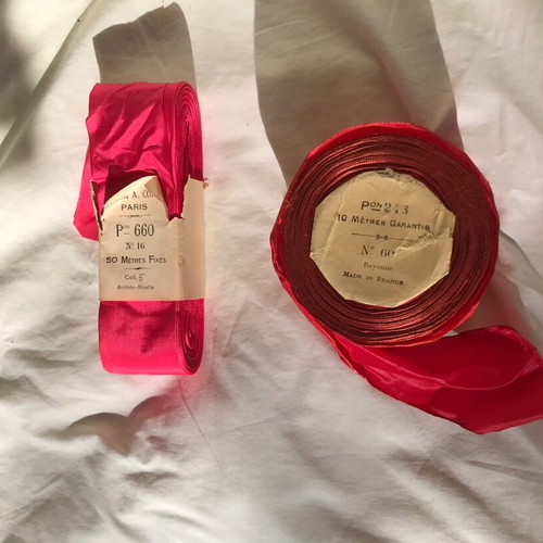 2 rolls of ribbons new in rose and fuchsia shades