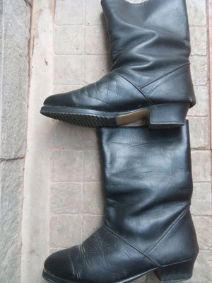 Black boots used, size 39, with black and white fur