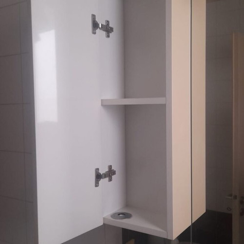 Bathroom furniture set used with sink and white mirror