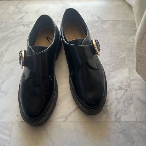 Women’s black H&M mules with high sole and gold buckle, like new, size 37