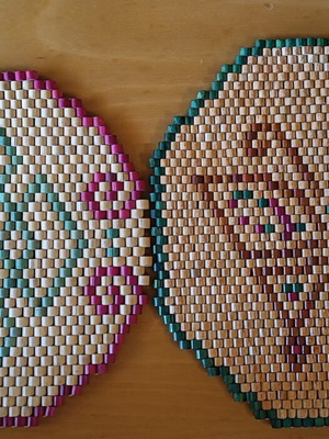 Wooden placemats like new with green and red designs