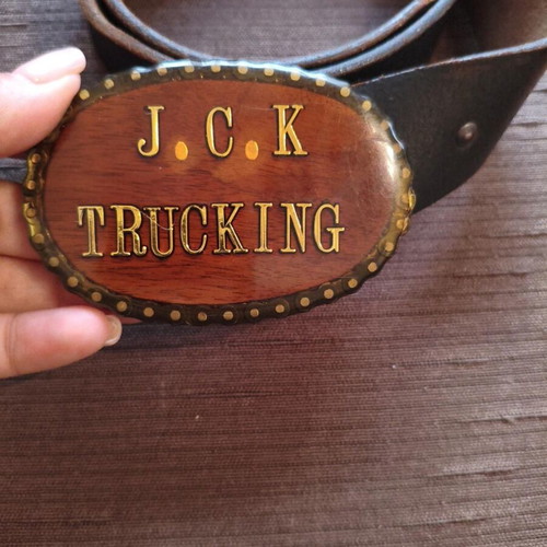Vintage leather belt used with handmade wooden J.C.K. Trucking buckle