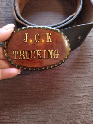 Vintage leather belt used with handmade wooden J.C.K. Trucking buckle