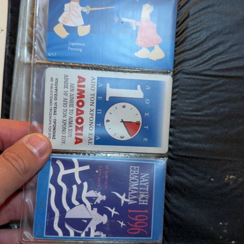 Vintage OTE phone card collection in black album