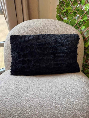 Wide fur pillow like new, black with removable fabric