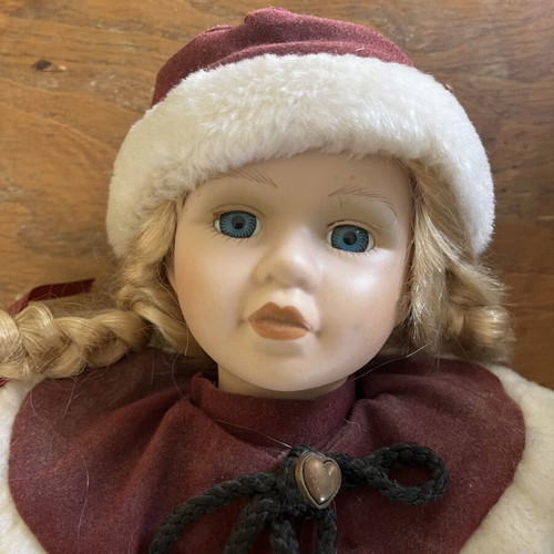 Porcelain doll with hat and braids, 40 cm