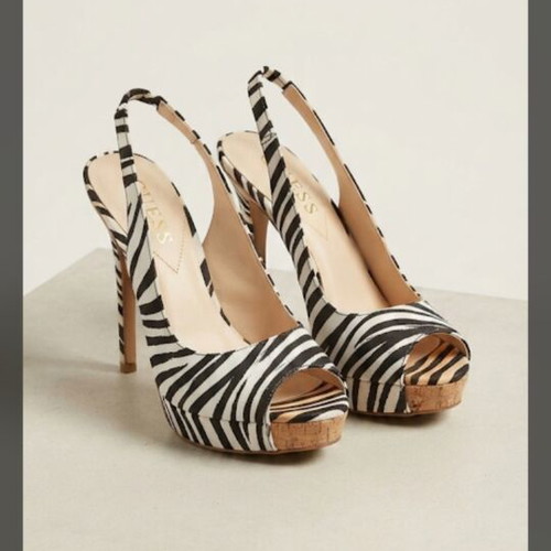 Guess pumps used, size 7M, black and white