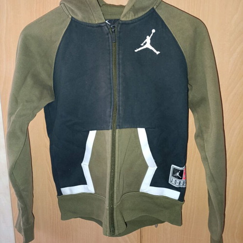 Jordan kids jacket used for ages 10 to 12, black and beige