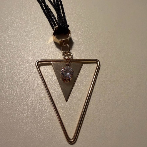 Pendant like new metal with 4-row black and gold chain with rhinestones