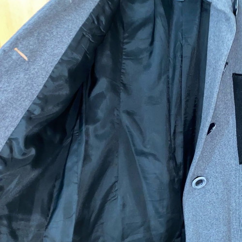 Women's coat used gray with black knitted details