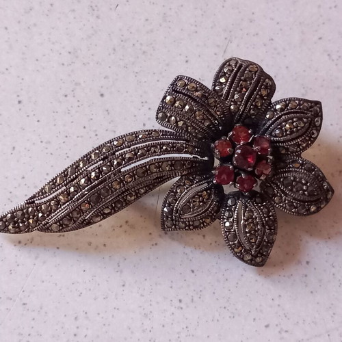 Silver 925 brooch with marcasite and garnet-colored stones used