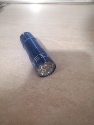 Battery flashlight 8.5 cm with 9 LED used, includes 3 AAA batteries