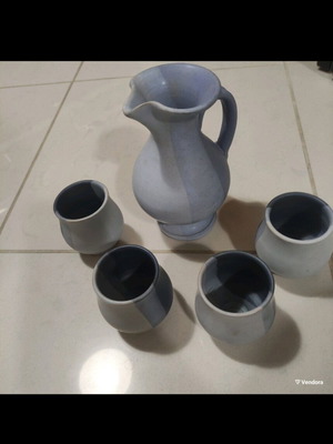 Ceramic pitcher with 4 glasses like new