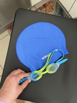 Swim cap and goggles used