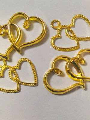 Double gold-plated hearts, pack of 100 pieces