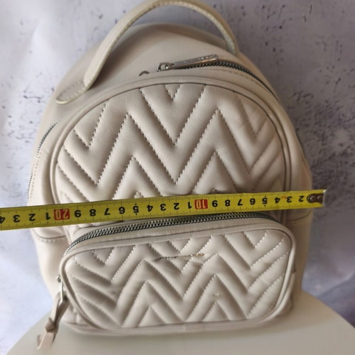 David Jones backpack used, beige with embossed design