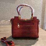 Red handbag new with strap and pockets