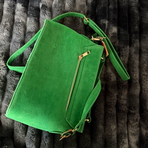 Green suede crossbody bag used with gold details