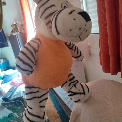 Stuffed tiger used, very soft cuddly animal