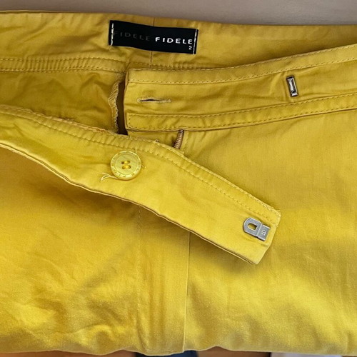Yellow pants used, size Small, elastic fabric