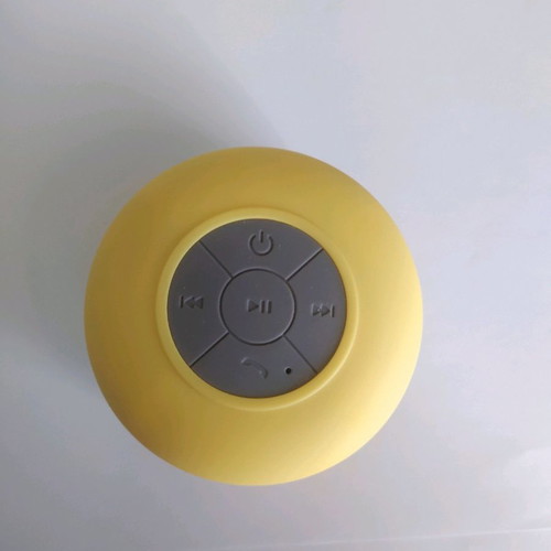 Bluetooth waterproof speaker yellow with detachable suction cup and charging cable