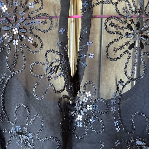 Short-sleeve blouse with transparency and sequins