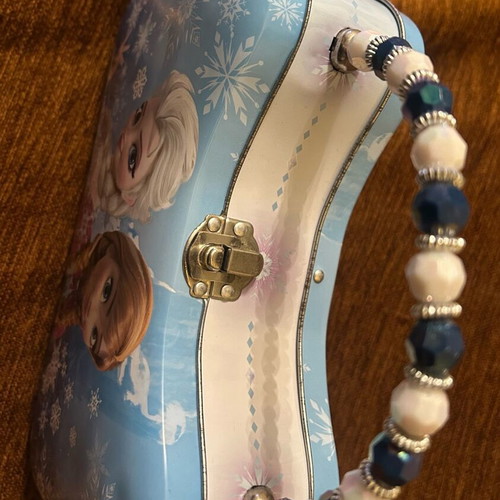 Disney Frozen collectible metal bag like new