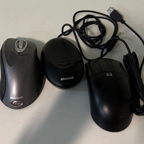 Microsoft Wireless IntelliMouse Explorer 2.0 with receiver and unused HP wired mouse