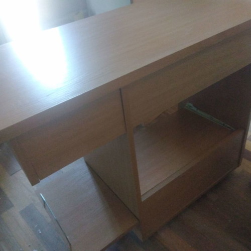 Computer desk with used office chair and wheels