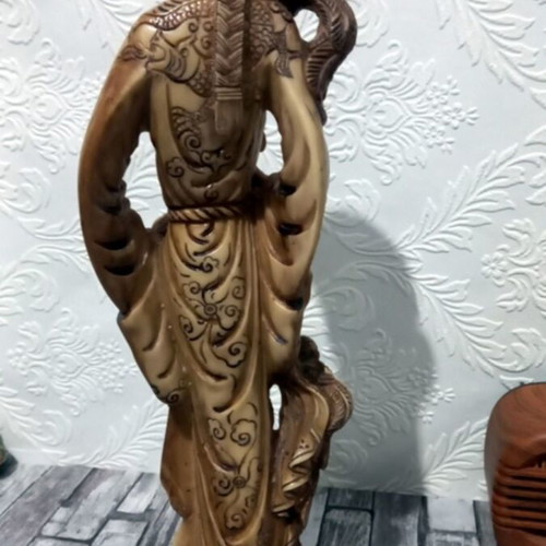 Decorative tabletop statue of Asian man like new