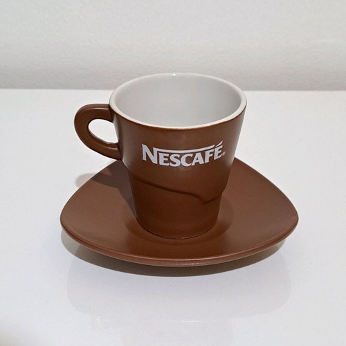 Nescafe collectible ceramic cup and saucer set like new