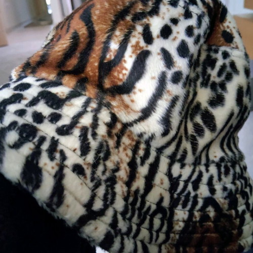 Winter hat women's used, synthetic fur leopard print