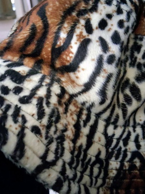 Winter hat women's used, synthetic fur leopard print