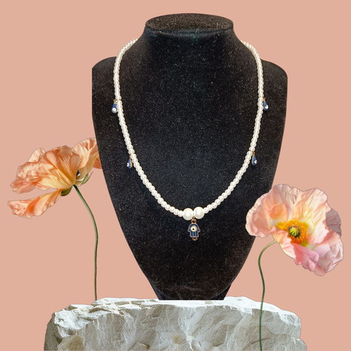 Handmade Hamsa hand necklace with evil eyes and white pearls new