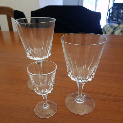 Crystal glassware set used with 11 water glasses, 12 wine glasses, 12 liqueur glasses