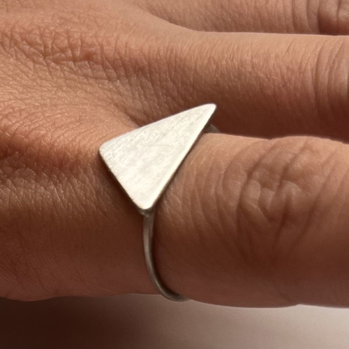 Triangular brass ring like new with thin band and textured finish