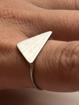 Triangular brass ring like new with thin band and textured finish