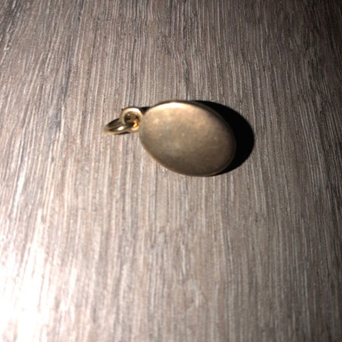 Women's pendant like new, gold-plated steel without chain