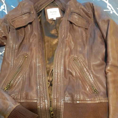 Brown leather women's jacket used with broken zipper