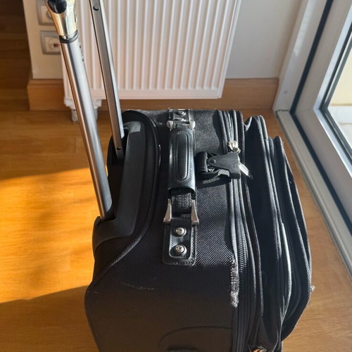 Delsey suitcase used with wheels small size black