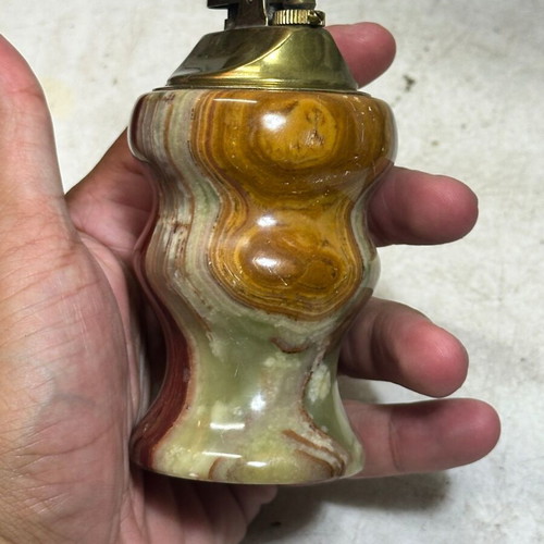 Vintage table lighter made of onyx with brass mechanism used