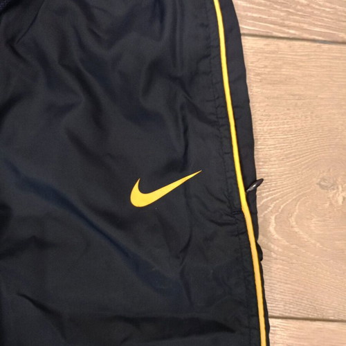 Vintage Nike track pants navy with yellow stripes like new