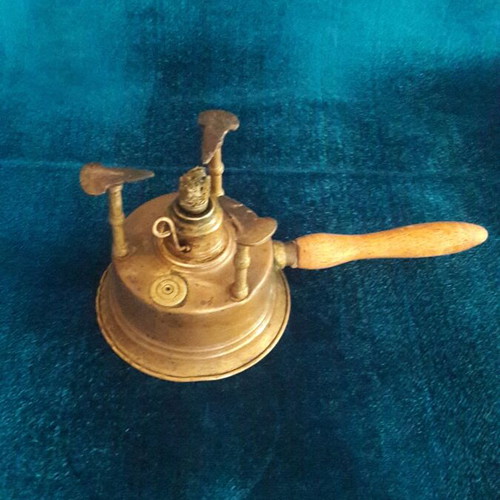 Vintage brass gas burner used with slight base deformation