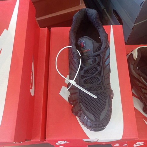 Nike Shox athletic shoes new, black and red