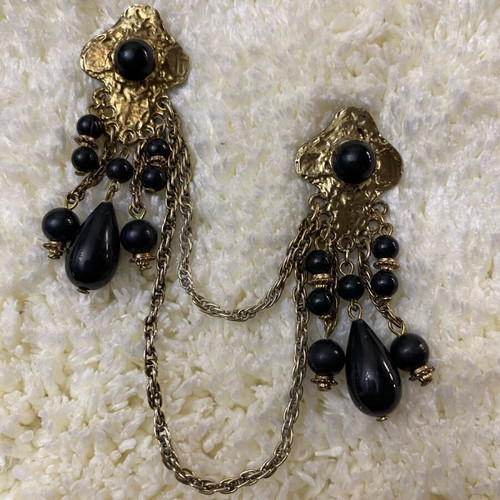 Vintage double brooch like new, gold color with black stones