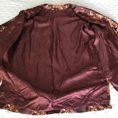 Women’s jacket used, size L, bronze satin with flowers