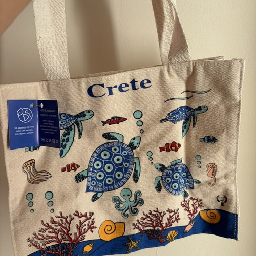 Crete small handbag like new, beige multicolor