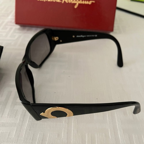 Salvatore Ferragamo sunglasses new, black with gold logo