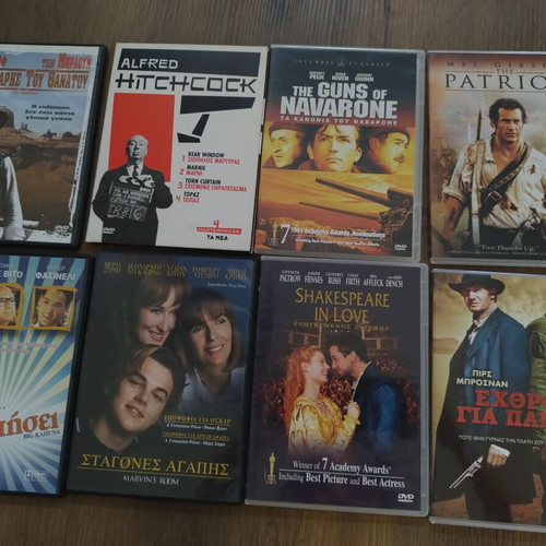DVD pack of 8 including Hitchcock box set with 3 of 4 DVDs, like new